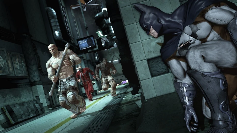 Batman is sneaking behind a corner while a buff dude holding a pipe is walking towards him, ready to be surprised.