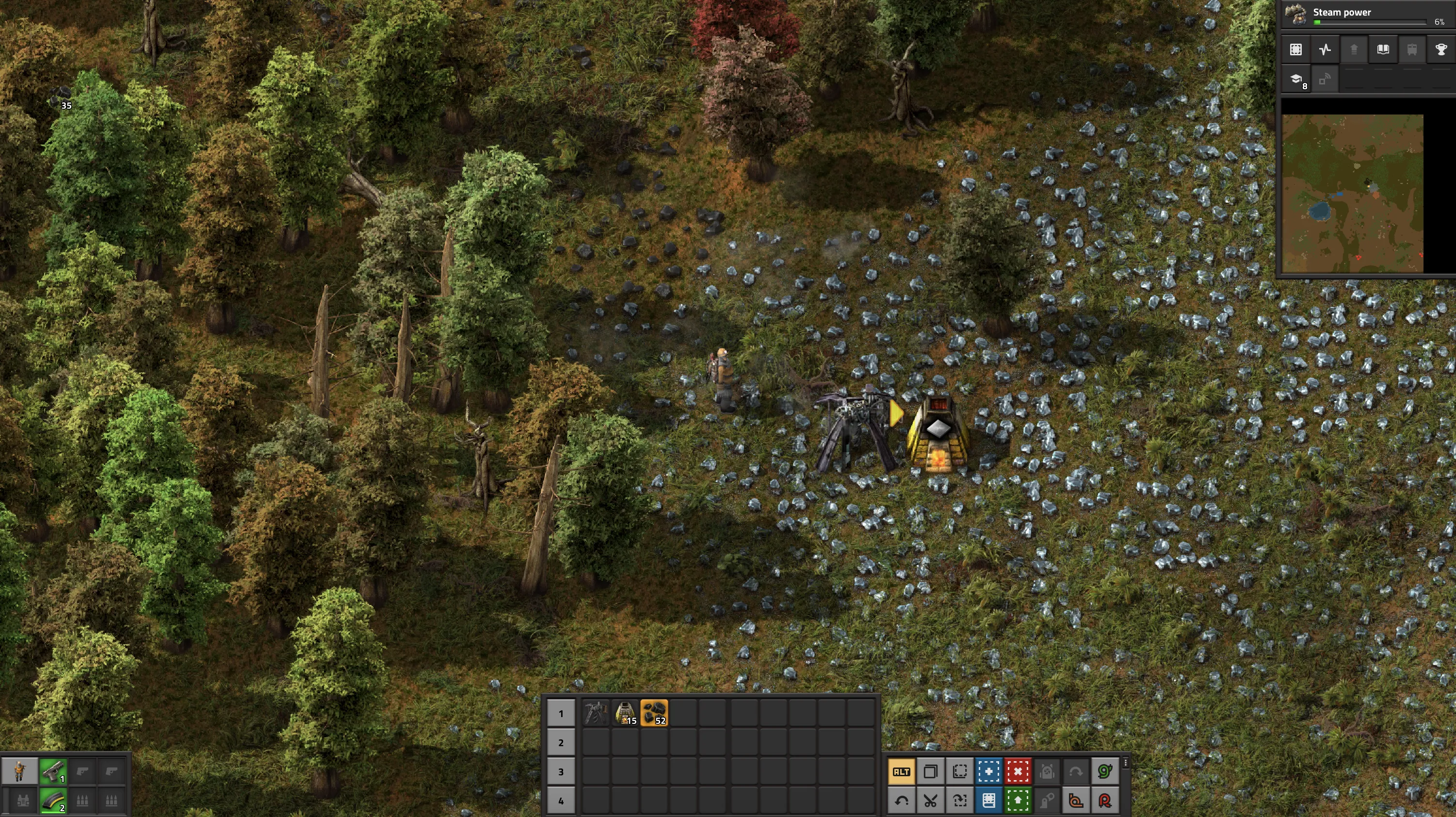 Factorio gameplay with a single miner and a single furnace turning iron ore into iron plates.