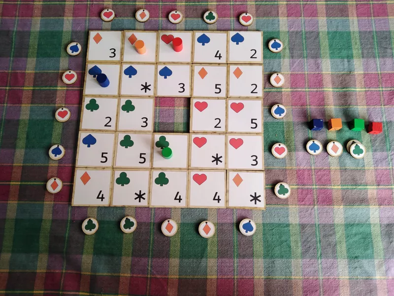 Complete piecepack system laid out: 24 tiles and 24 coins in four suits as well as four cylinder pawns and four cubes in four colours (blue, orange, green and red).