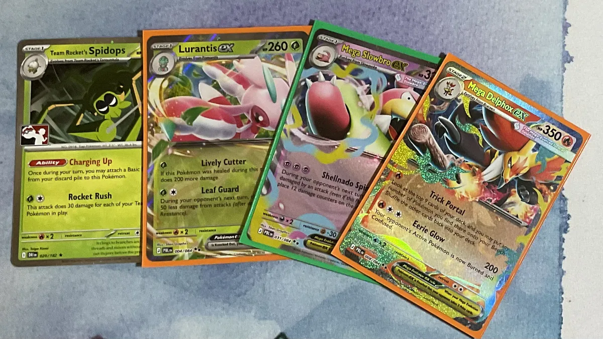 Pokemon TCG cards: Team Rocket's Spidops, Lurantis ex, Mega Slowbro ex and Mega Delphox ex