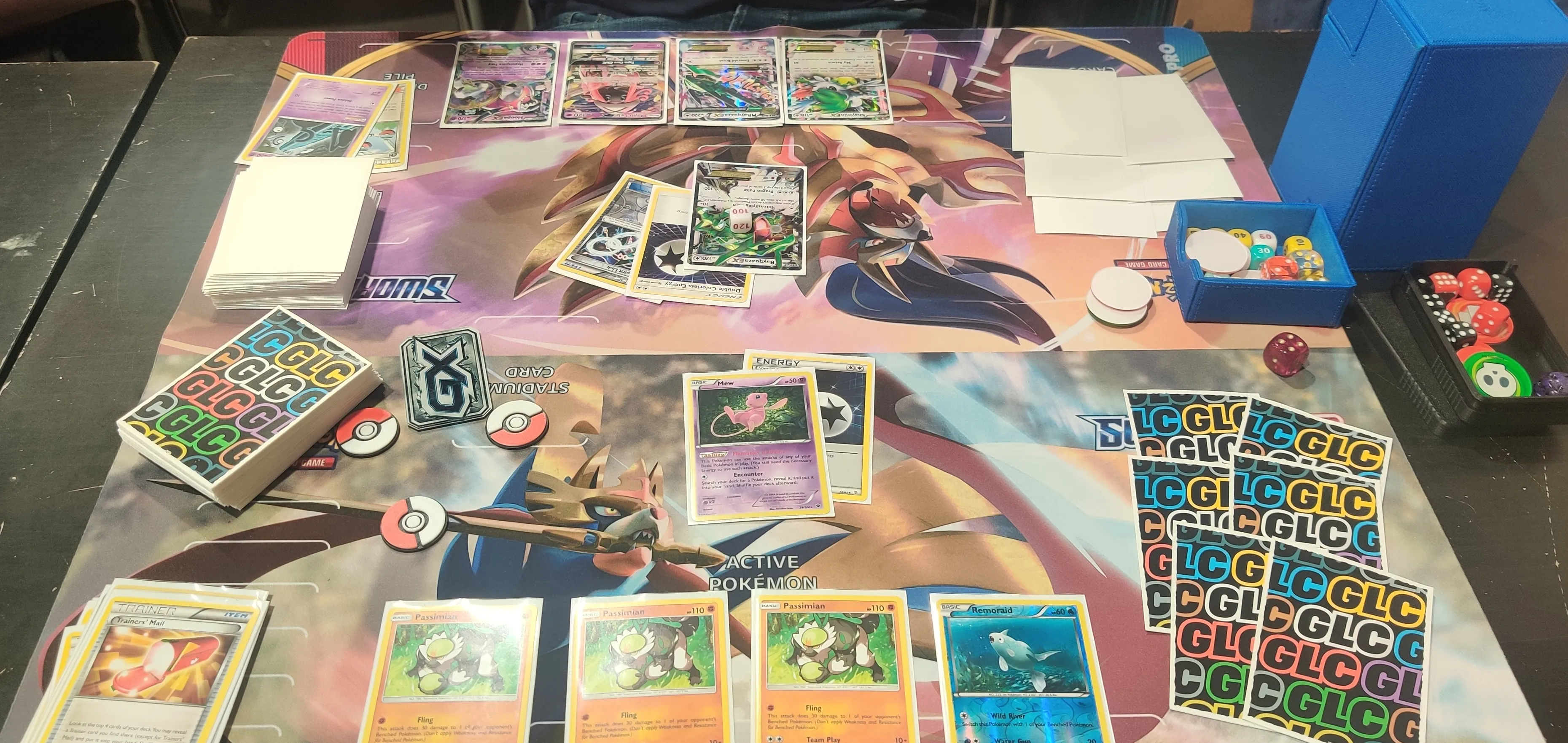Gameplay of Pokemon TCG between my Passimian deck and my opponent's Mega Rayquaza deck