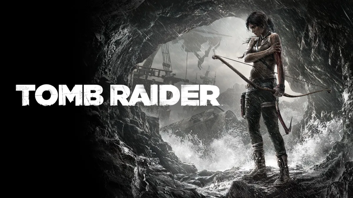 Tomb Raider game art with a bruised and bloody Lara Croft standing at a cave entrance with stormy ocean in the background. She's holding a bow on her left hand and holding her left arm with her right.