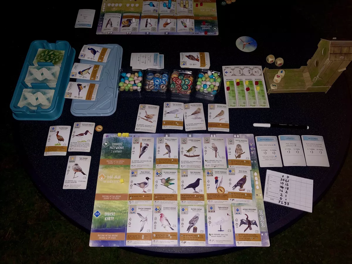 A two player game of Wingspan in the end phase with a full board.
